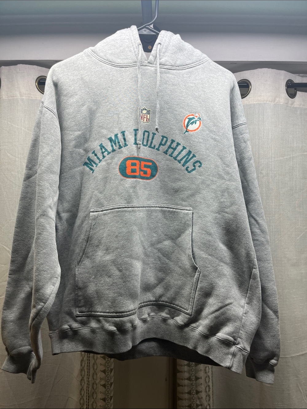 Gray Pullover Hoodie with Miami Dolphins logo.